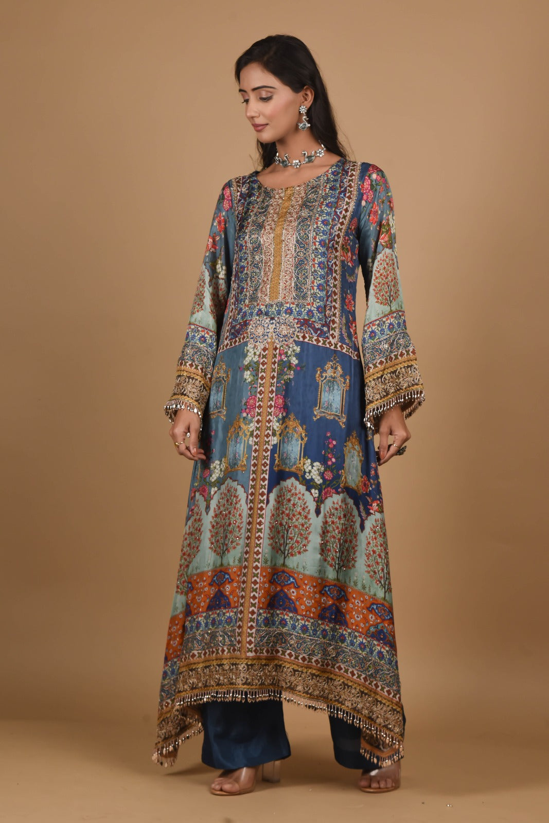 Blue colored Pakistani patterned suit set