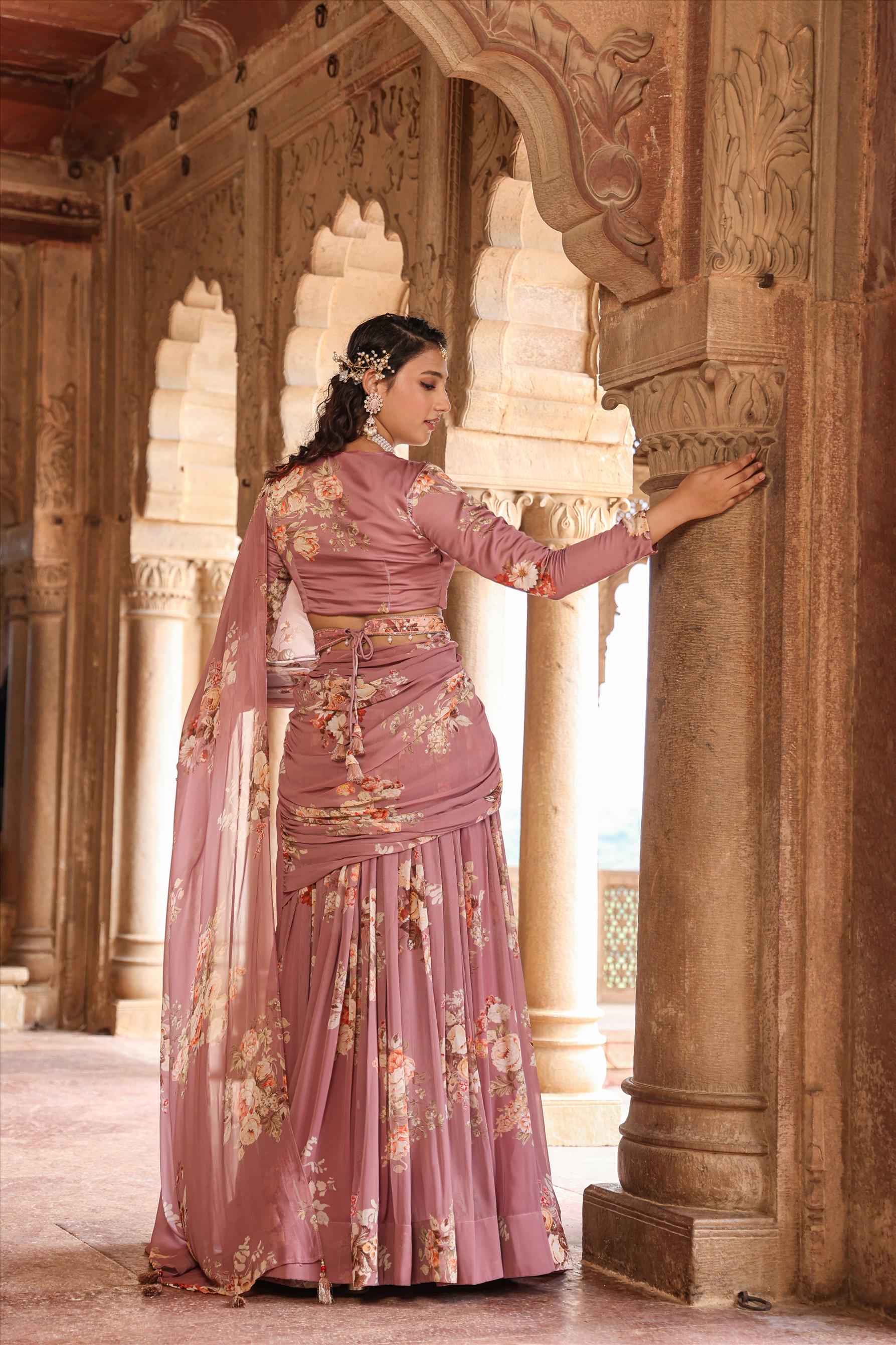 Peach colored drape saree