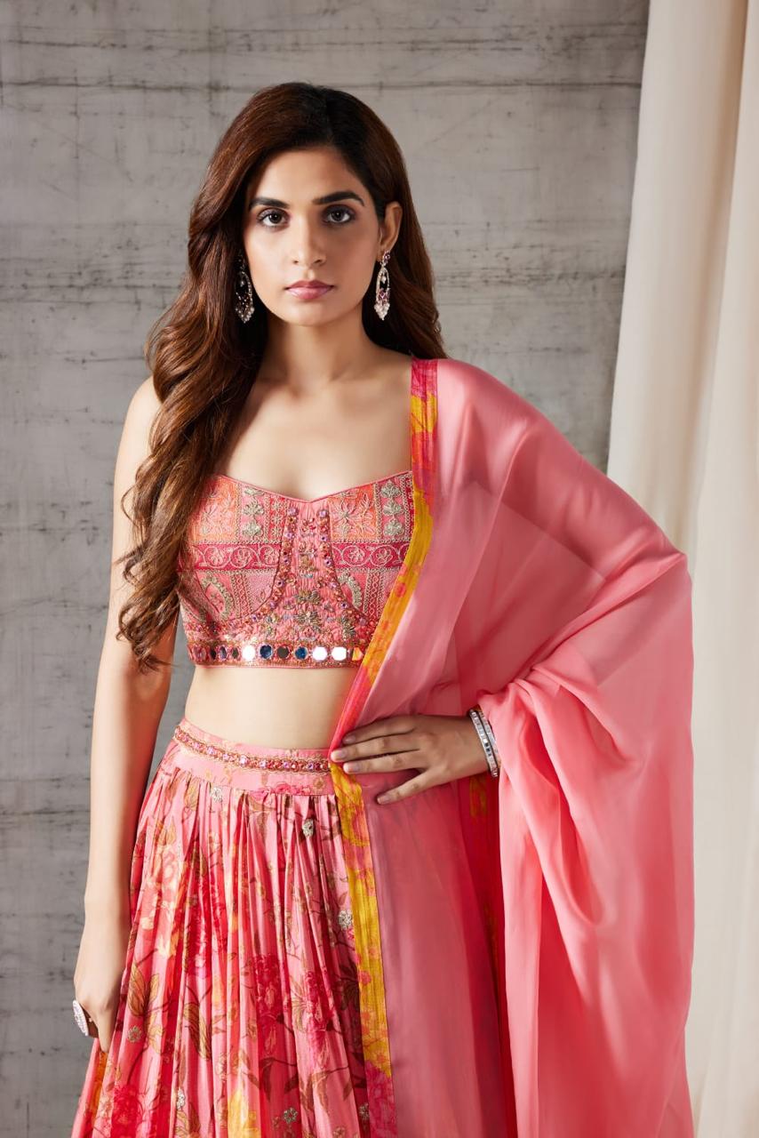 Pink colored bustier lehenga set