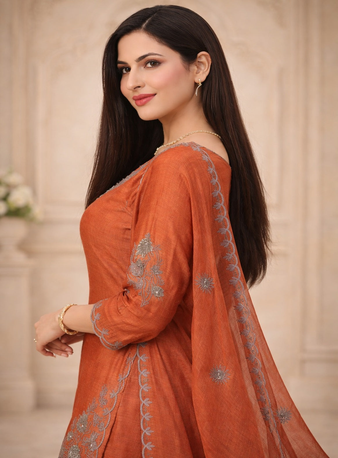 Green and orange kurta set with neck embrodery